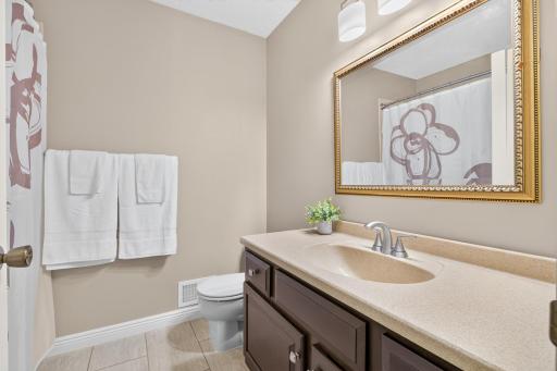 Updated full bathroom on the main floor provides plenty of space for guests as well as tub/shower for 2nd bedroom