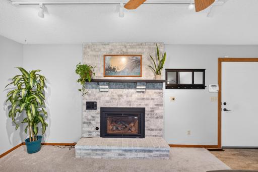 Gas fireplace with beautiful brick surround