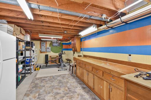 Workshop with work bench and workout area