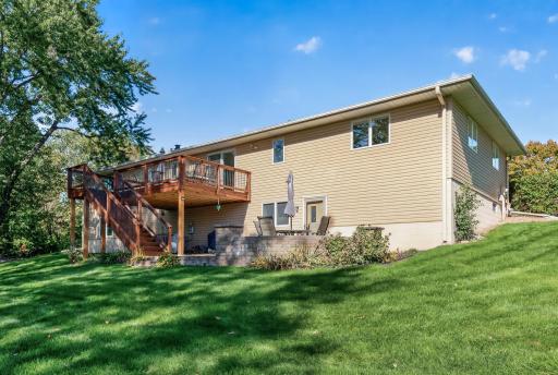 View from backyard showing newer deck and paver patio!