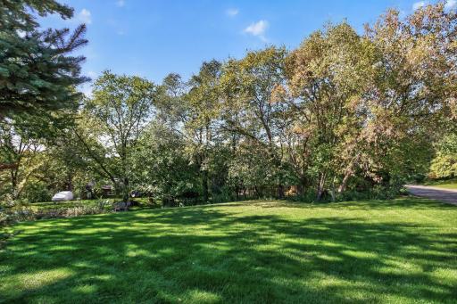 Backyard is level on one side - perfect for yard games