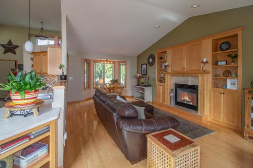 Dining offers a bay window & hardwood floors