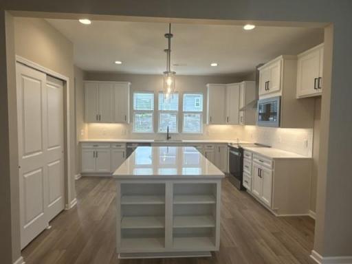Bright and spacious kitchen featuring ample cabinetry, sleek countertops, and a functional layoutâperfect for everyday living and entertaining.
