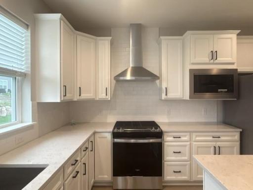 Equipped with stainless steel appliances and contemporary fixtures that combine style and efficiency.jpg