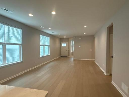 The welcoming entryway sets the tone for the home with clean lines, natural light, and inviting finishes.