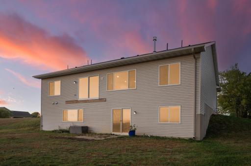 Back of home affords you awesome views from each room over the additonal acreage