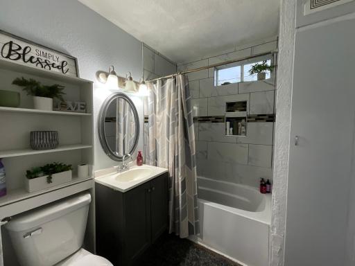 Full Bath with New tub and tiled suround.jpg