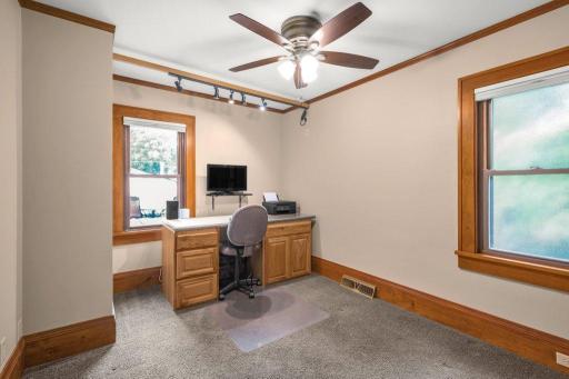 Bedroom two on the main level is currently used as an office/craft room