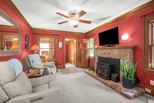 Beuatiful brick fireplace with a wood-burning insert.