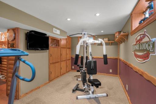 The exercise room is also packed with storage space. The addition to the home was the main level plus added space in the basement.