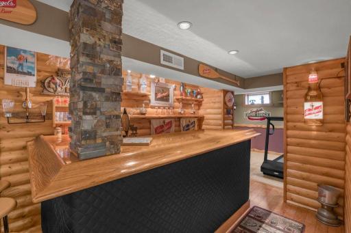 Downstairs - SURPRISE! A wetbar with that "Up North" vibe.