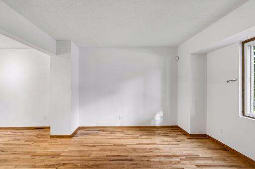 Living room with hardwood flooring.
