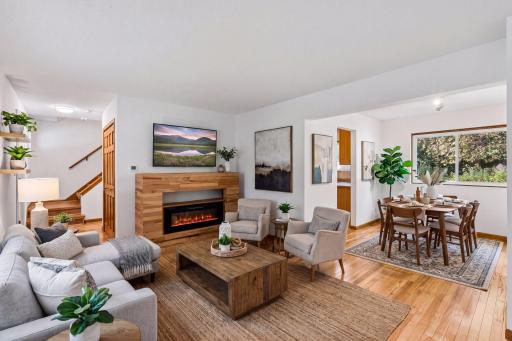 Virtually staged. Fireplace insert shown is digitally added and is not present or included in the sale. See unstaged photo for existing condition.