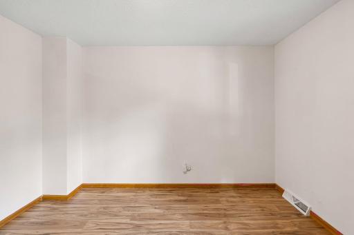 Additional view of bedroom three and its flexible furniture space.
