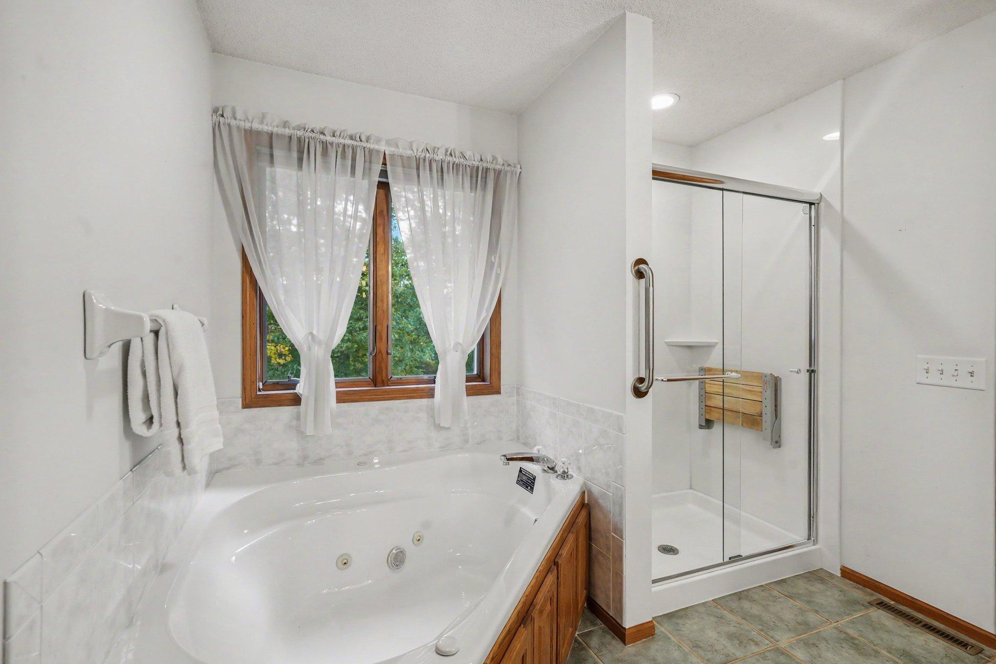 Large bathroom overlooking your backyard