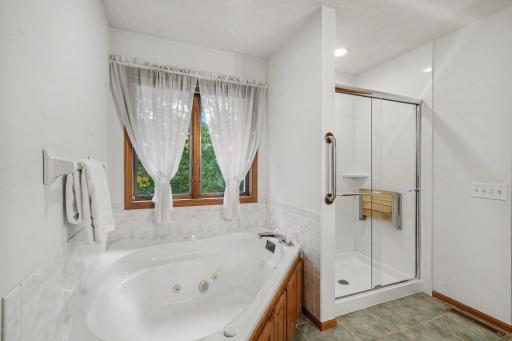 Large bathroom overlooking your backyard