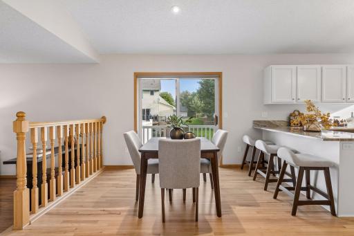 Dining room walks out to large maintenance free deck.