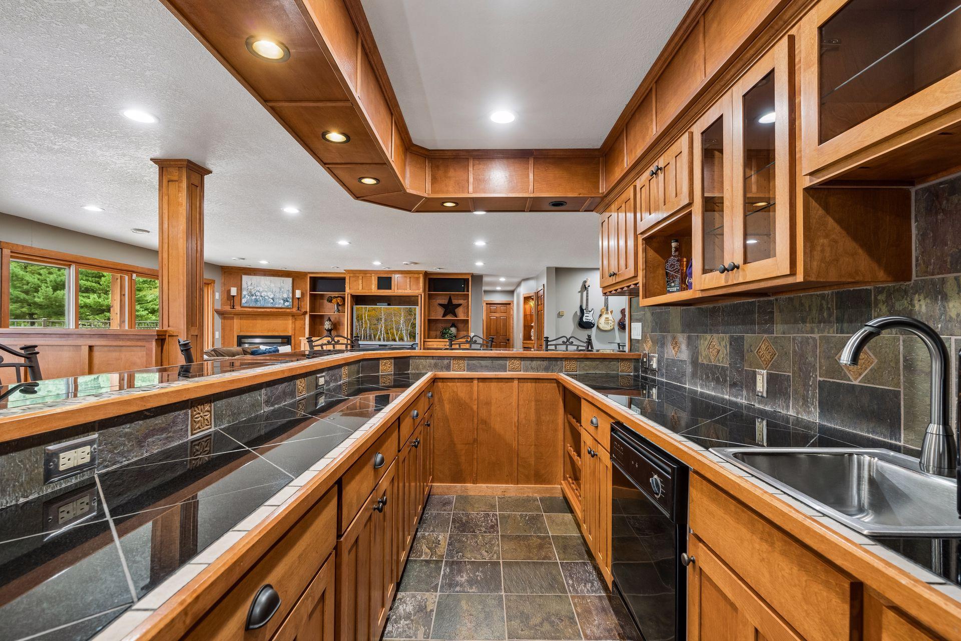 Lower Level Full Bar w/Sink, Fridge, Dishwasher
