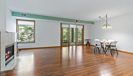 Beautiful Hickory-plank Laminate Flooring throughout.
