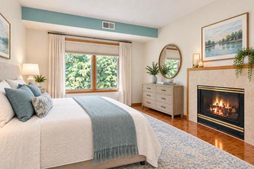 Virtually Staged. Second Bedroom, Parquet Wood Floors, Dual-sided Heat & Glo Fireplace