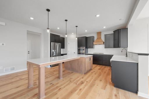 For representational purposes only. The kitchen is a centerpiece of this home, the perfect place to gather with friends and family.