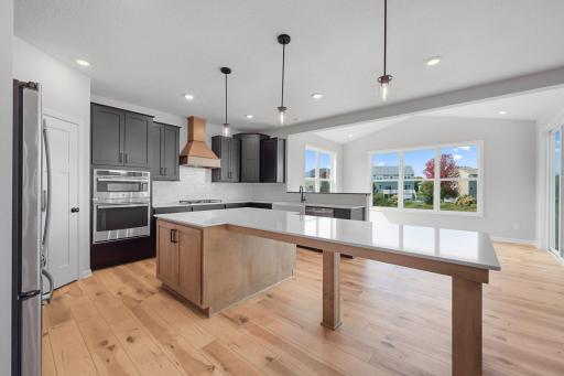 For representational purposes only. The kitchen is perfect for the gourmet chef and for entertaining, with stylish stainless appliances and beautiful quartz countertops.