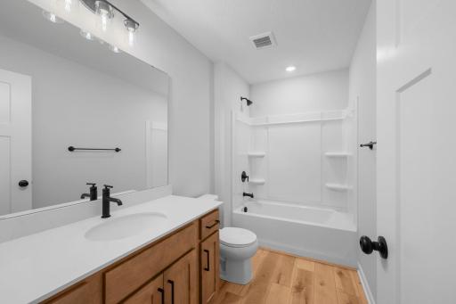 For representational purposes only. The upper level main bath is convenient and spacious! It is perfect for servicing the upper level bedrooms.