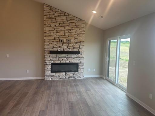 Fireplace with stone accents, as shown in 8852 63rd St. S.