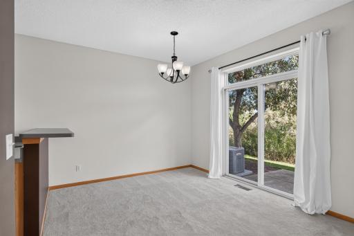 Informal Dining room with sliding glass door to the back yard