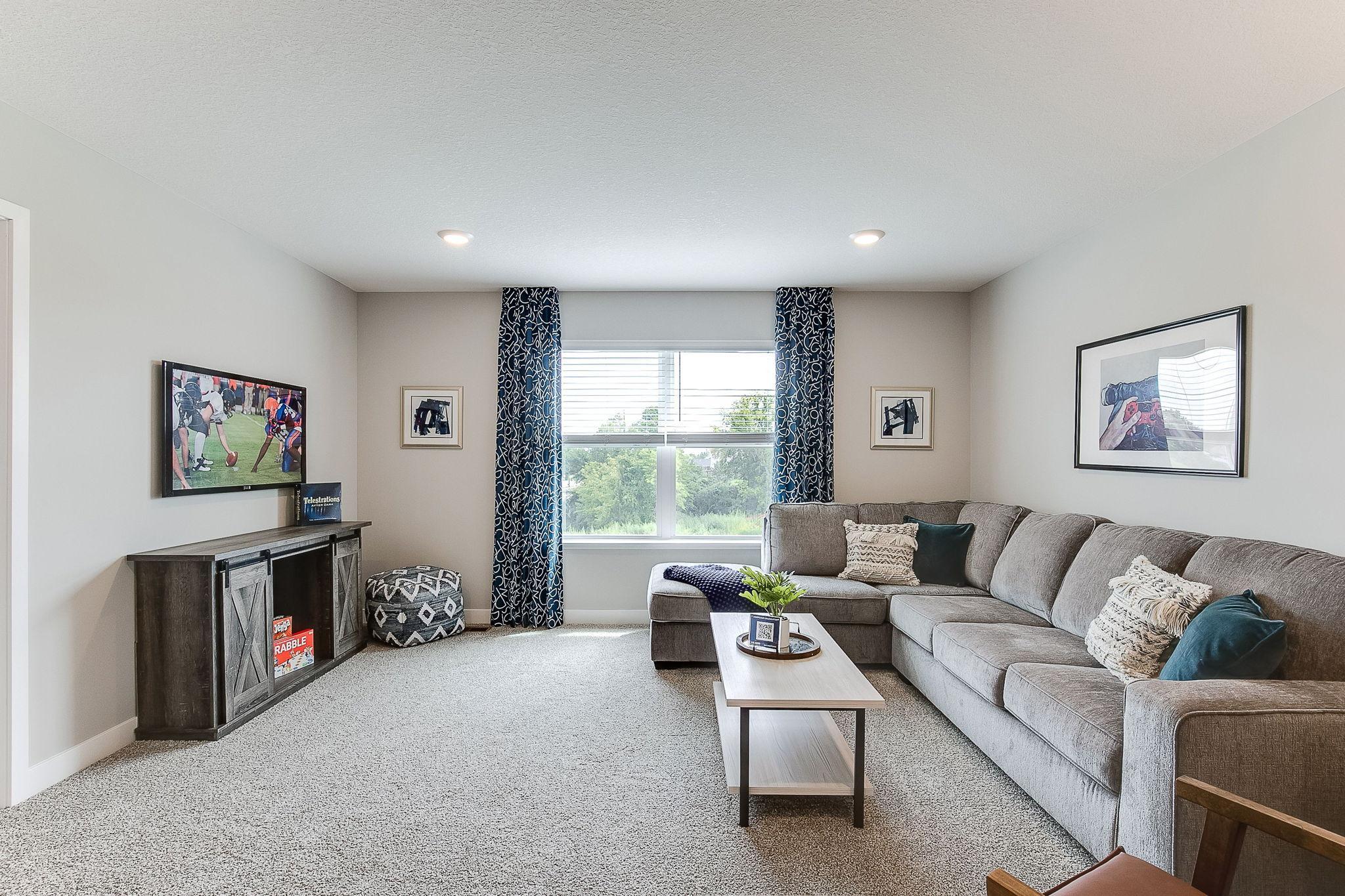 Relax in your spacious loft or turn it into a game room space! *Picture is of model home; actual finishes may vary.