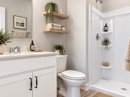Main level bathroom and shower. *Photo is of similar home. Virtually staged.