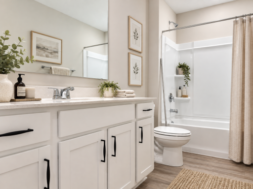 Upper level main full bathroom. *Photo is of similar home. Virtually staged.