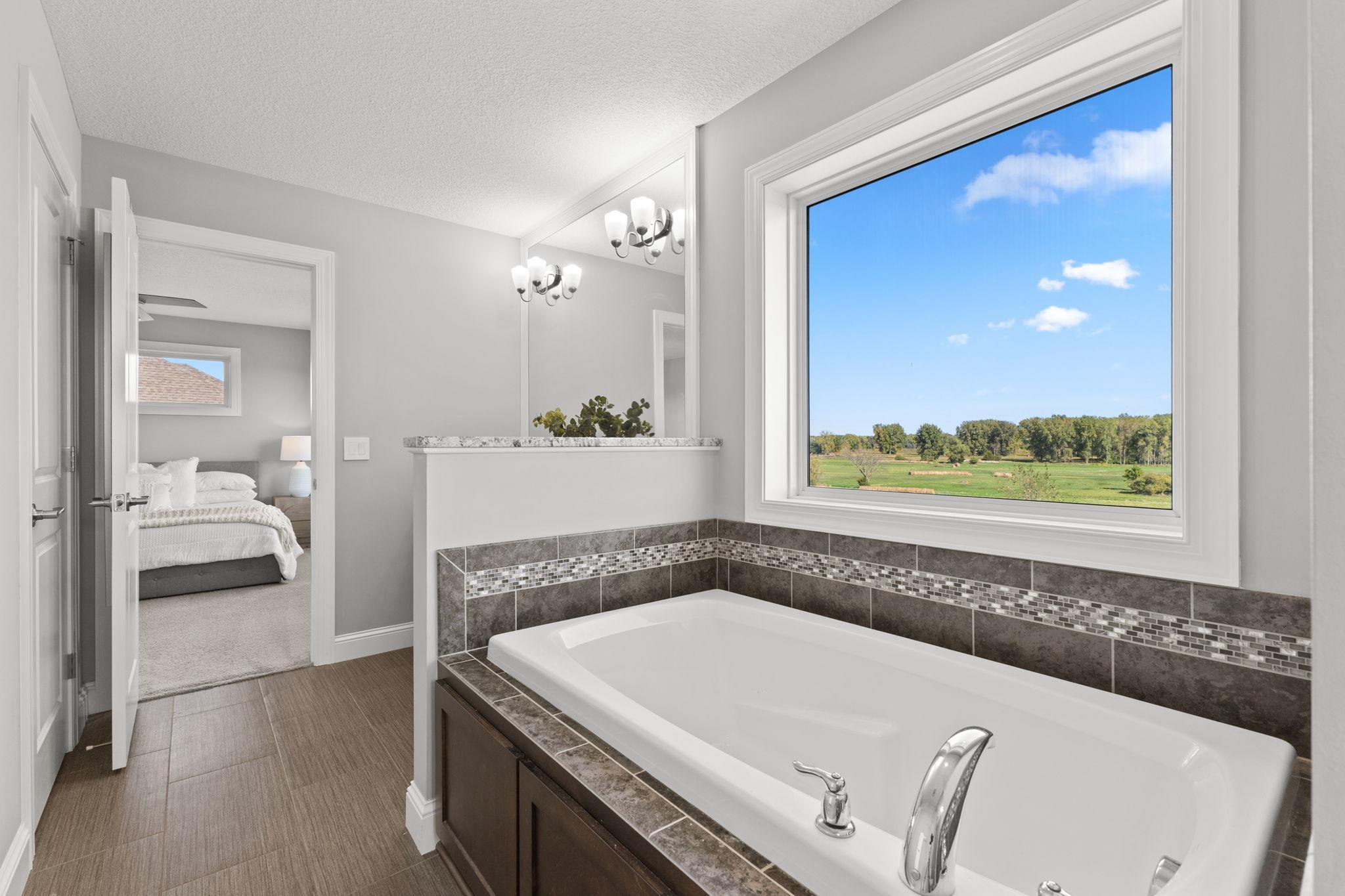 Soaker tub with picture window
