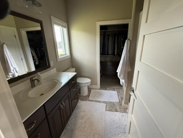 walk-in closet in the mstr bath
