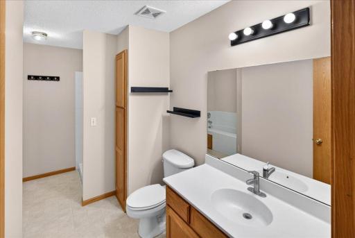 Ensuite full bathroom with tub and separate walk-in shower