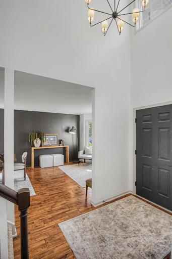 Thoughtful main-level layout with gleaming hardwood floors and a welcoming front entry.