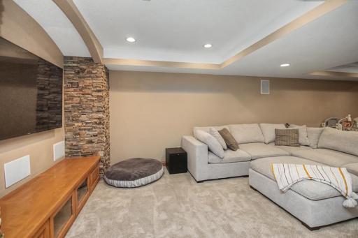 Custom architectural details add character to the lower-level gathering space.