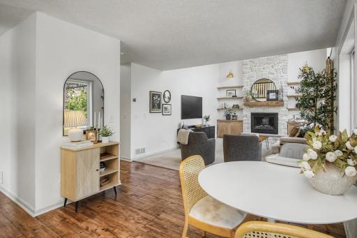 Open-concept design keeps the kitchen, informal dining and living room connected.