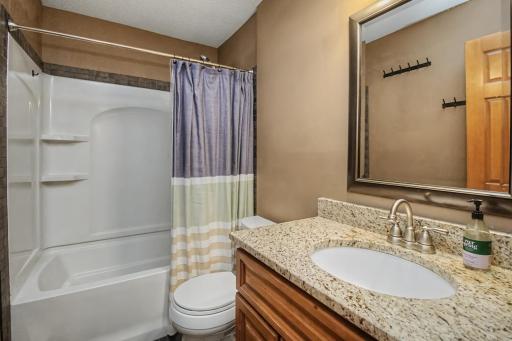 Lower-level full bath adds convenience just steps from the bedroom and family room.