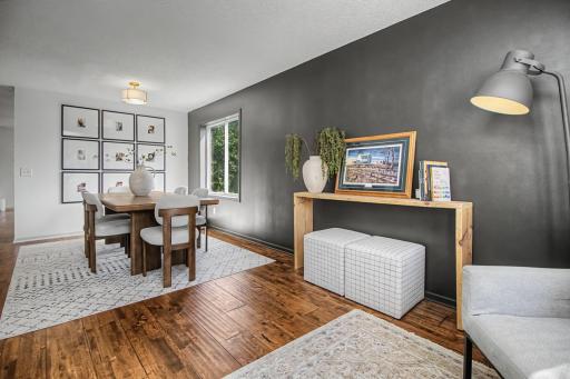 Inside, the formal dining room boasts hardwood floors and abundant natural light.
