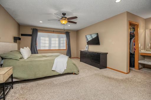 Generously sized primary bedroom with plenty of room for your preferred bed size and any additional large furniture.