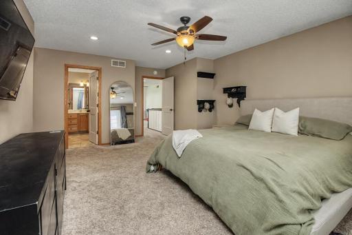 Primary suite includes a walk-in closet and private ensuite bath.