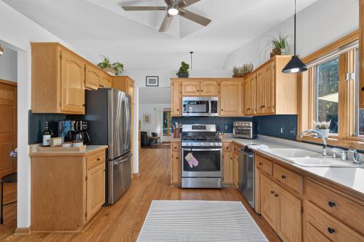 Generous counter and cabinet space makes the kitchen functional for everyday living.