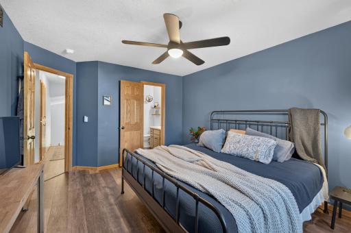 The primary bedroom also offers a private ensuite bath.