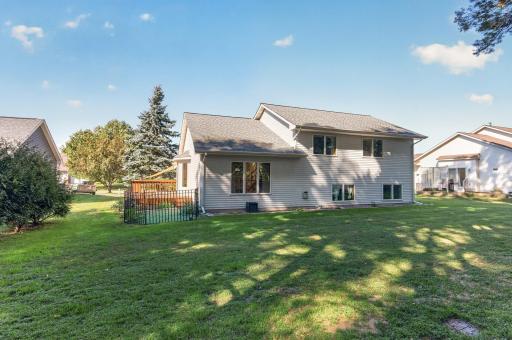 Expansive backyard offers plenty of green space to enjoy throughout the seasons.