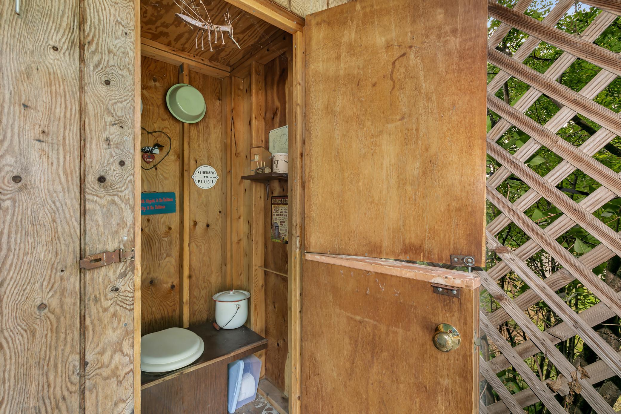 Outdoor, detached privy
