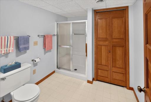 Lower Level 3/4 Bathroom with extra linen closet for all your bathroom storage needs