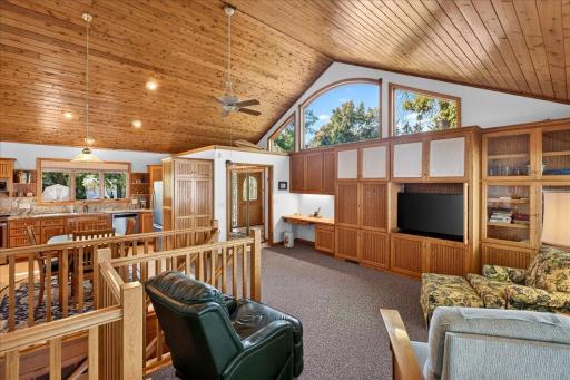 Open Concept and Vaulted Great Room with Knotty Alder Ceiling and Custom Built-In Cabinetry