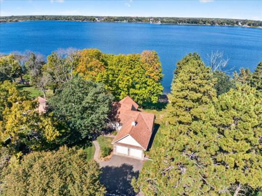 Welcome Home to 12500 Melody Lane 3BR | 3BA | 4Car Garage at the end of the road 3/4 Acre Lot and 102' of sandy Lakeshore