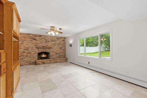 Family room with brick wood-burning fireplace